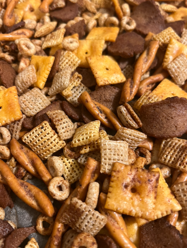 Chex Mix with rice and corn squares, cheez its, pretzels, rye chips and cheerios